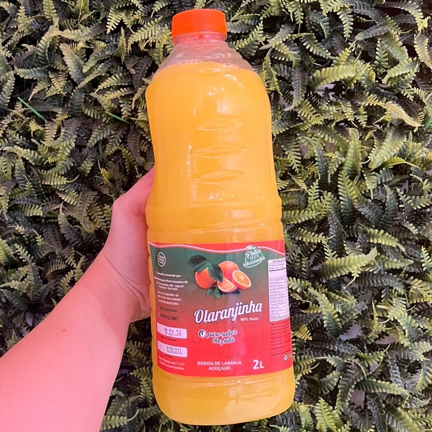 Suco de laranja natural Laranja, água e açúcar O Puro Sabor da Fruta
