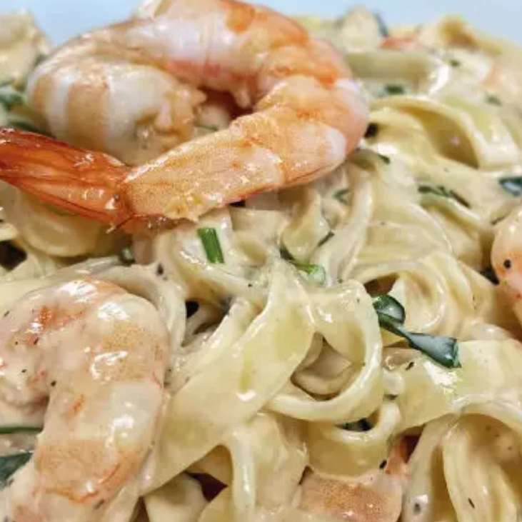 Fetuccini a la Crema con Langostinos