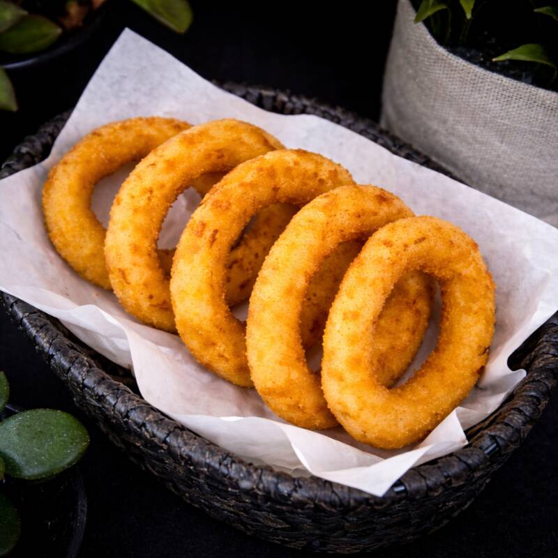 5 unidades de cebolas empanadas. Acompanha barbecue.