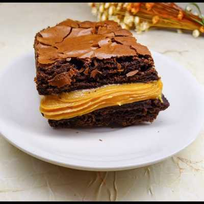 Brownie chocolatudo recheado com clássico doce de leite. 100gm