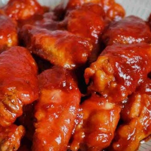 1/2 DE ALITAS EN SALSA BBQ