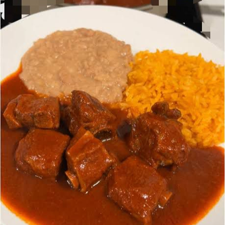 Costilla De Puerco En Salsa Roja