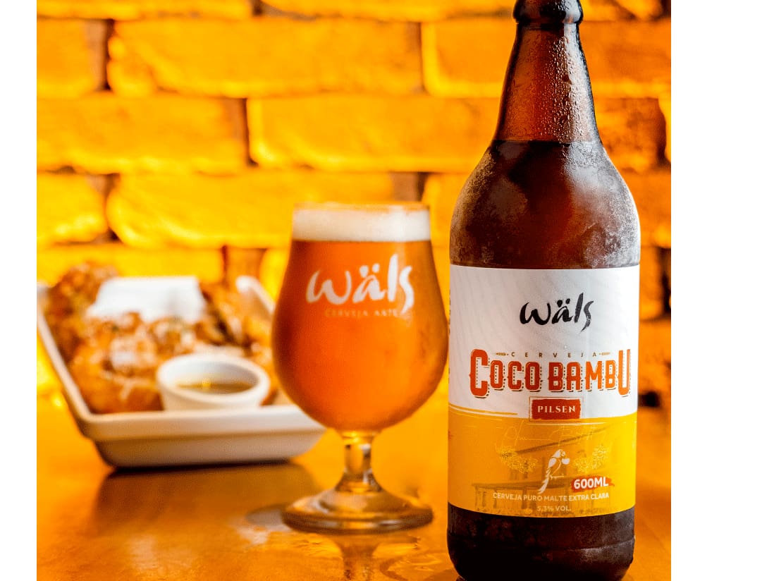 Criada em parceria com a cervejaria mineira Wals, de Belo Horizonte, nossa cerveja artesanal, puro malte tipo pilsen é de alta qualidade. Possui coloração dourada, sabor limpo, com sutis notas frutada