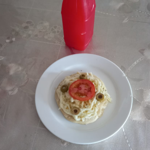 1 deliciosa Mini Pizza de Presunto e Queijo + 1 saboroso Suco Natural variados, já peça e saboreie nossas delicias