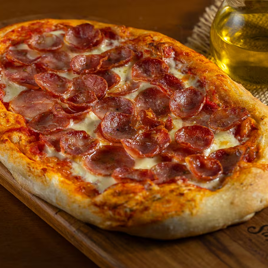 Massa artesanal, molho de tomate da casa. Aproximadamente 380g