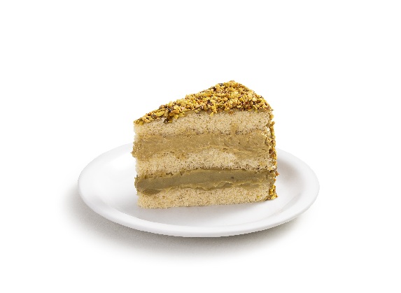 Bolo de massa branca, recheios de trufado e aerado de pistache, cobertura de trufado de pistache e pistache granulado.