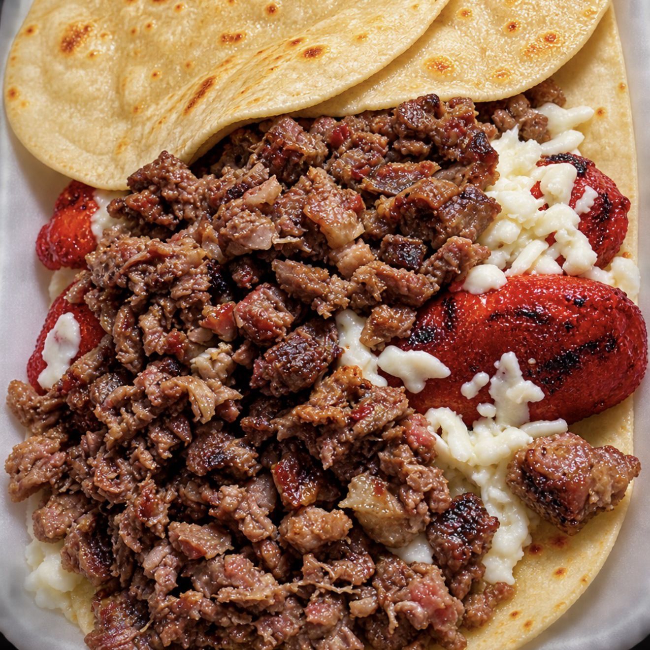 Salchicha Especial con Carne Asada
