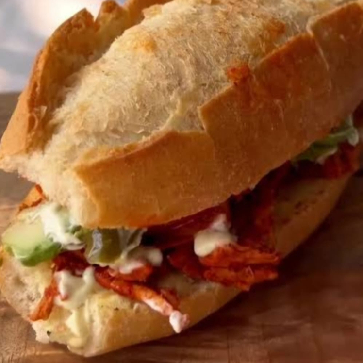 Lonche de Pierna+Coca Cola lata 345ml