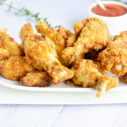 6 Alitas Broaster con Papas Fritas