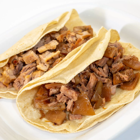 2 Tacos de Carnitas Surtida