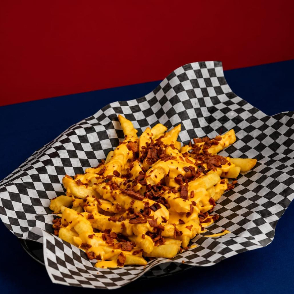 Papas Cheddar + Tocineta