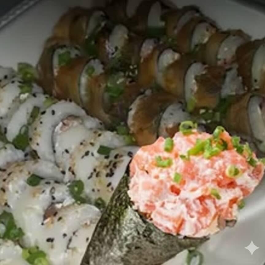 Descubra o sabor inigualável do nosso 'Combo Top Salmão', uma oferta imperdível na categoria 'Promoções'. Este pacote exclusivo inclui 1 Temaki meticulosamente preenchido com a deliciosa e suave pasta de salmão, 12 peças de Carioca de Salmão e 12 Uramaki de Salmão. Cada peça é cuidadosamente preparada para proporcionar uma experiência gastronômica única, destacando a riqueza e o frescor do salmão. Saboreie esta delícia autêntica e exclusiva!