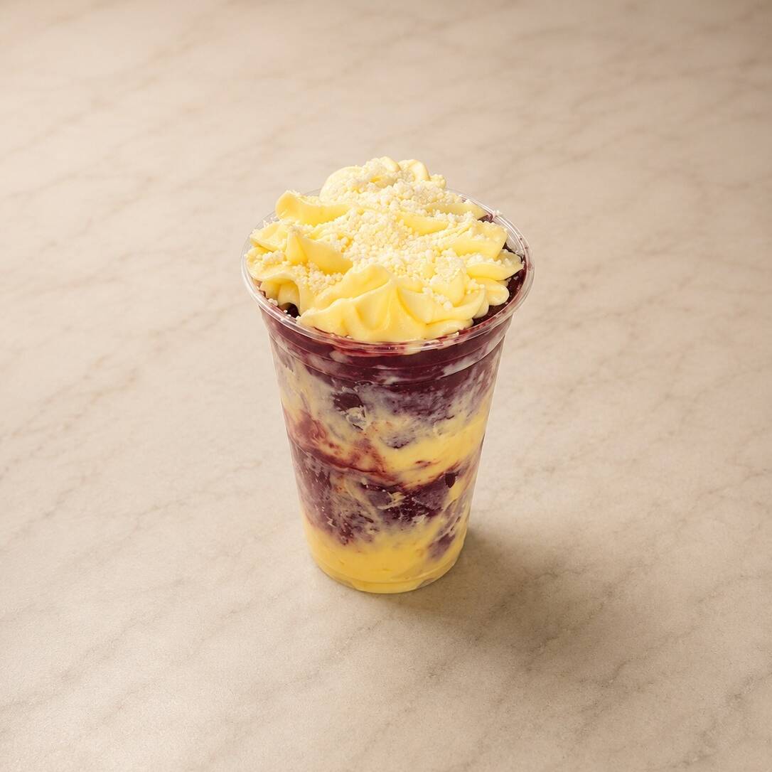 Açaí cremoso combinado com um delicioso creme de Ninho, finalizado com leite em pó e um toque irresistível de leite condensado. Uma mistura perfeita, doce na medida certa e cheia de sabor.