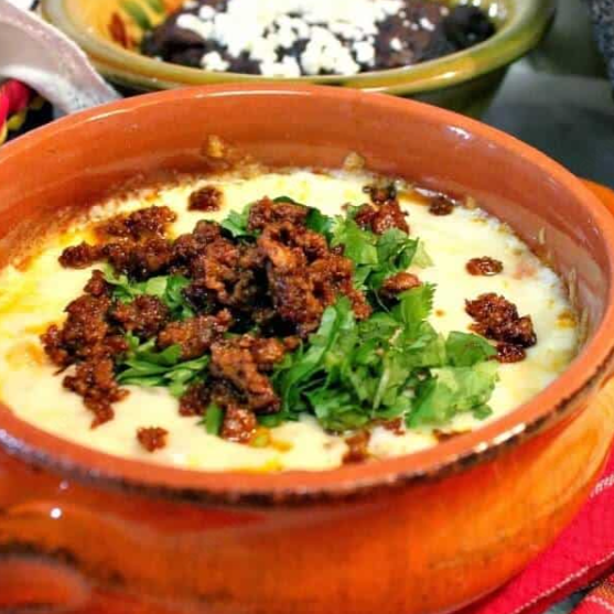Queso Fundido con Chorizo y Chicharrón Rib Eye