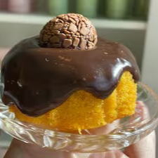 Massa de Cenoura caseira com cobertura de Brigadeiro Belga e 1 docinho de brigadeiro. Obs. 1: não alteramos nenhum produto ou retiramos/adicionamos ingrediente. Obs. 2: produto de consumo imediato. Obs. 3: alguns produtos podem vir com vencimento do mesmo Dia.