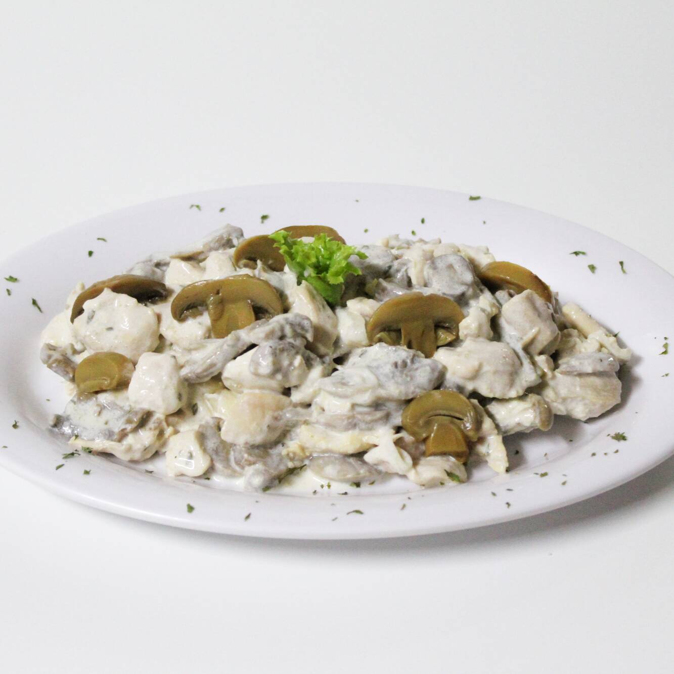 Pollo con Crema y Champiñones