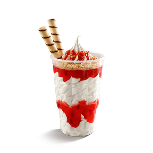 Bebida láctea sabor baunilha com uma super camada de cobertura de morango e ainda por cima com farofa de paçoca. O canudo completa a tentação.