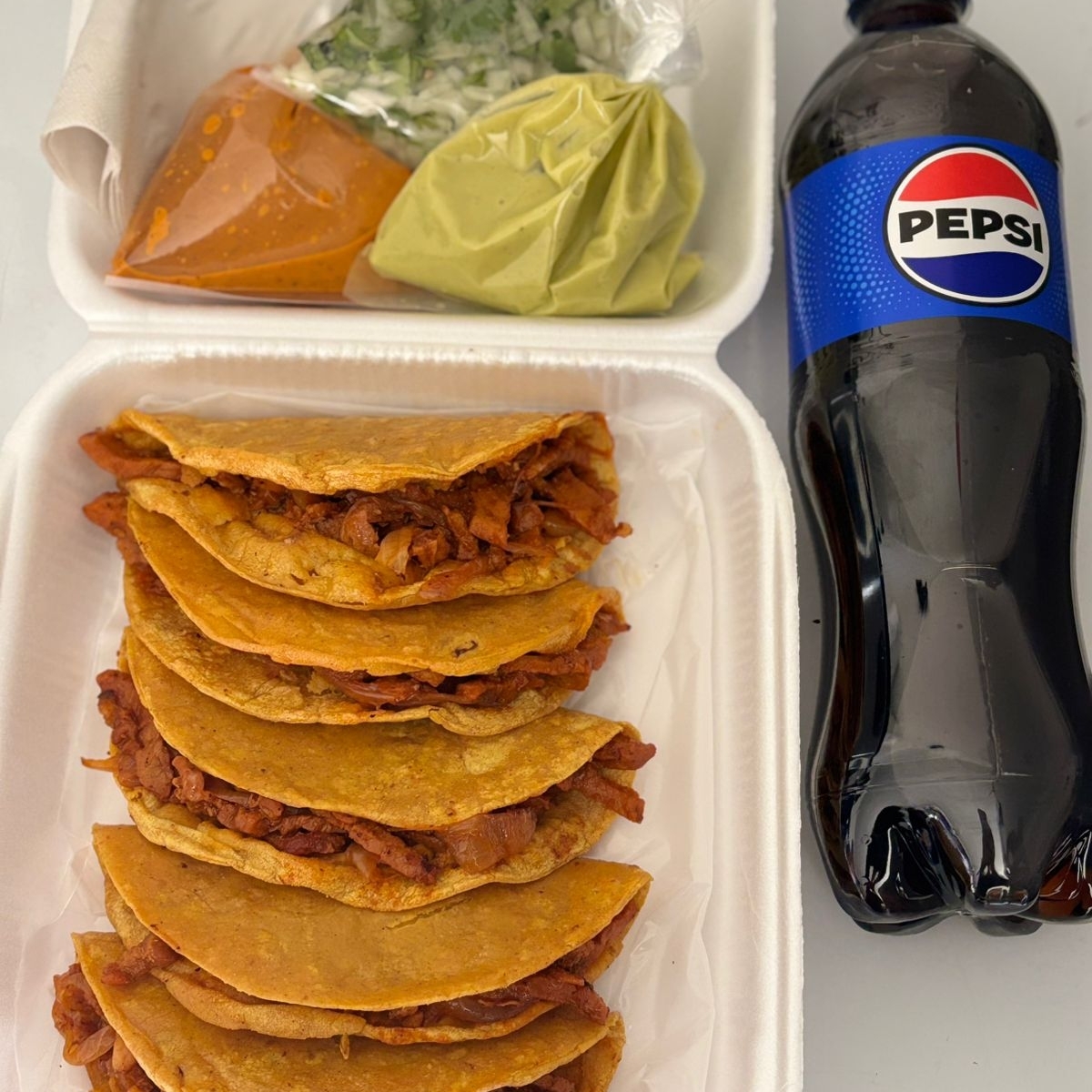5 TACOS DE TROMPO Y PEPSI 600 ML