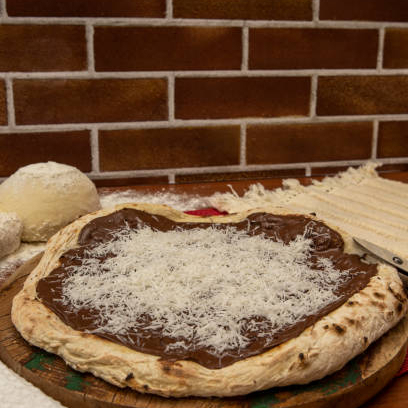 A pizza de mais de 1 sabor será cobrada pelo preço cheio do sabor mais caro.