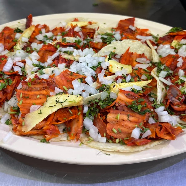 10 tacos al pastor (incluye 1l de agua)