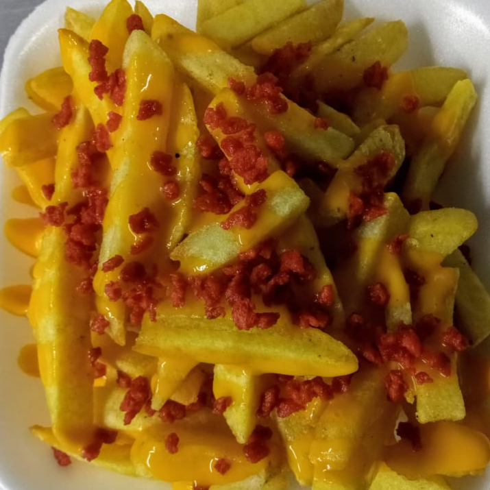 PAPAS A LA FRANCESA CON QUESO Y TOCINO
