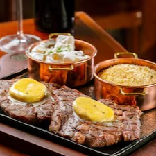 Bife Ancho 600g in natura. Acompanha: Maionese de leite com batata, farofa crocante e manteiga de ervas finas