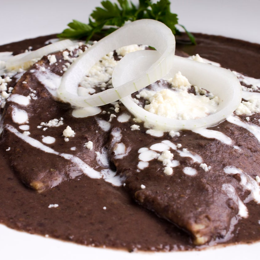 enfrijoladas (6 pzs)