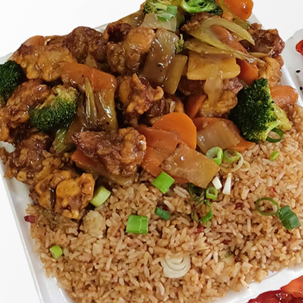 GRANDE. 1 Guisado + Arroz Frito.