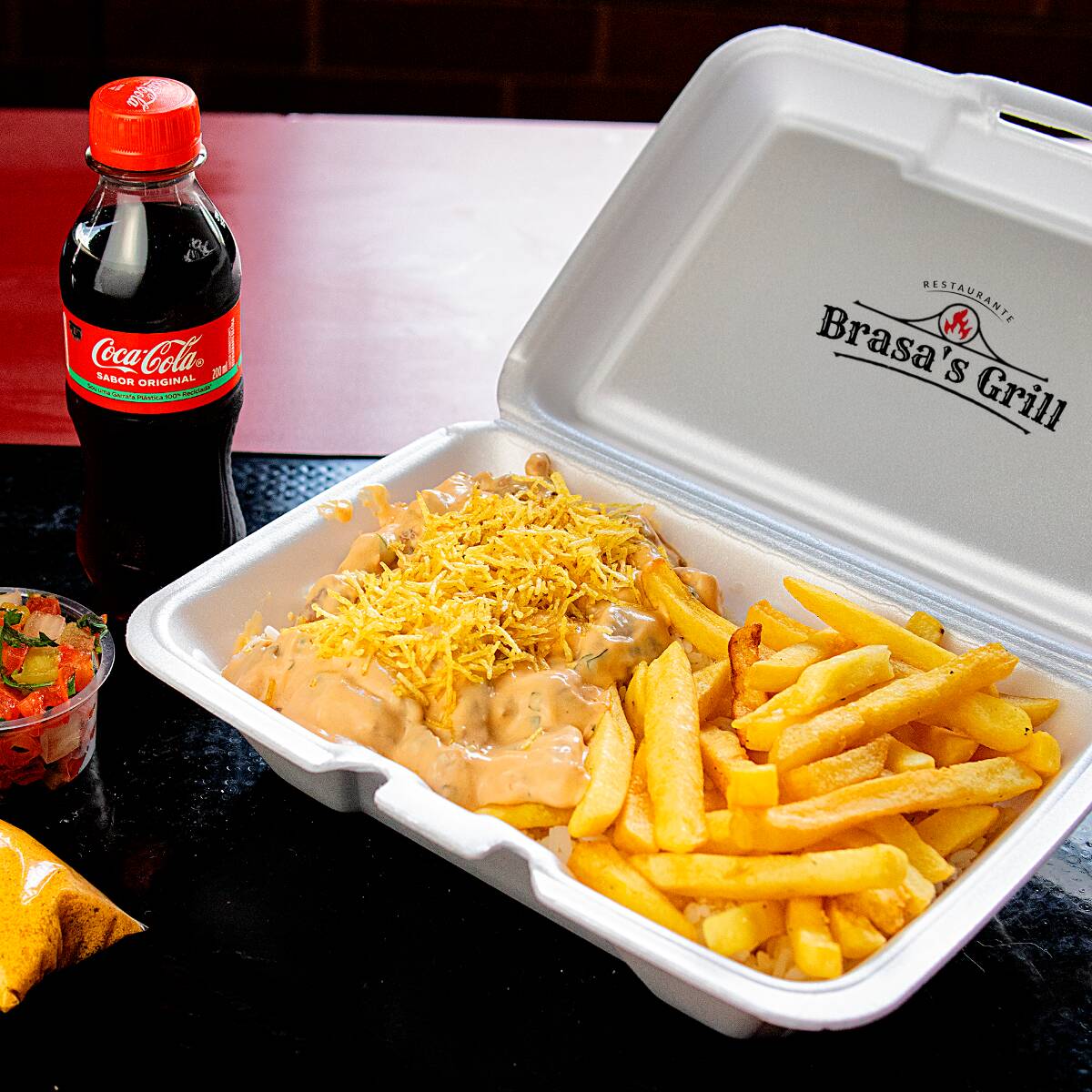 Acompanha arroz, feijão, salada e fritas + Caçulinha 200 ml