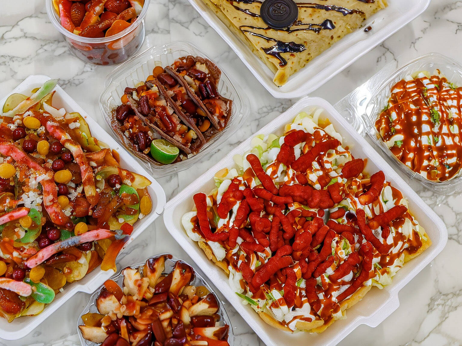 Kiubo Chucherías y más "La Raza"