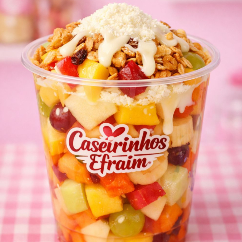 Salada de frutas refrescante, com melão, mamão, maça, manga, laranja, granola, leite condesado, caso o cliente queira retirar algo informar por mensagem.