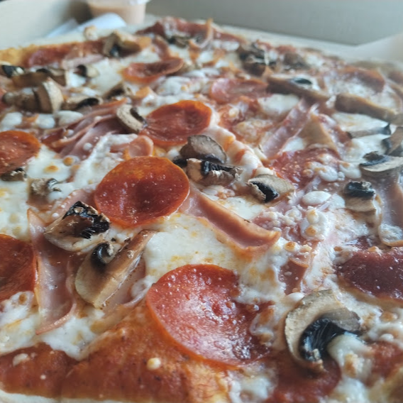 Pizza Bigotes especial. 35 cm 8 reb.