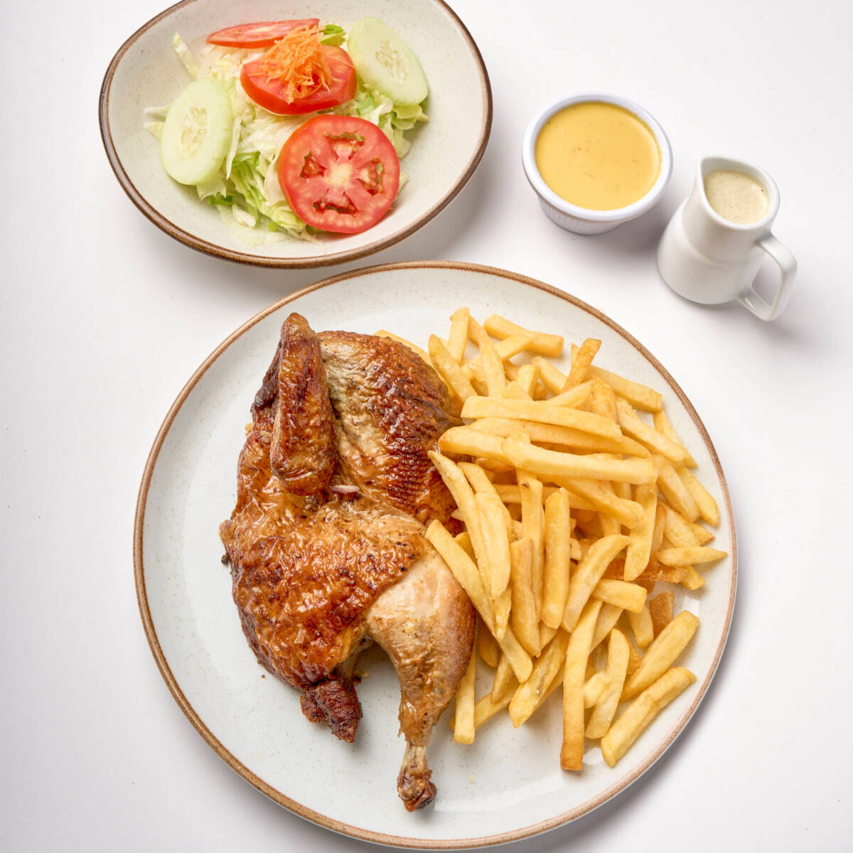 1/2 Pollo a la Brasa con Papas y Ensalada