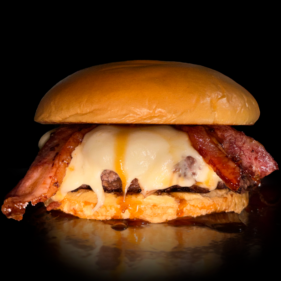 Dois Smash Burguer de 100g cada, fatias de queijo mussarela bem derretidas, fatias de bacon e melado de cana. Uma combinação Celestial!