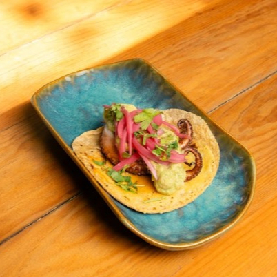 Tacos costra de queso y pulpo