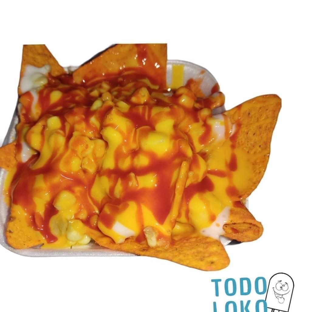 Charola de papas preparadas con elote