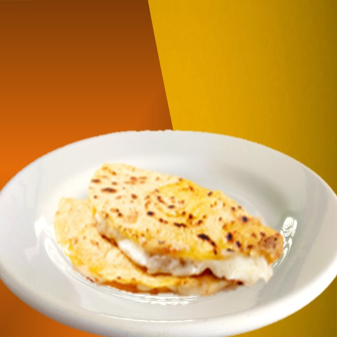 Taco de Guiso con Tortilla Hecha a Mano