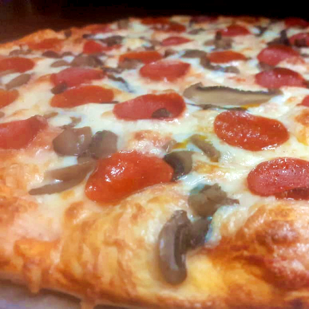 pizza grande de champiñones con jamon y pepperoni
