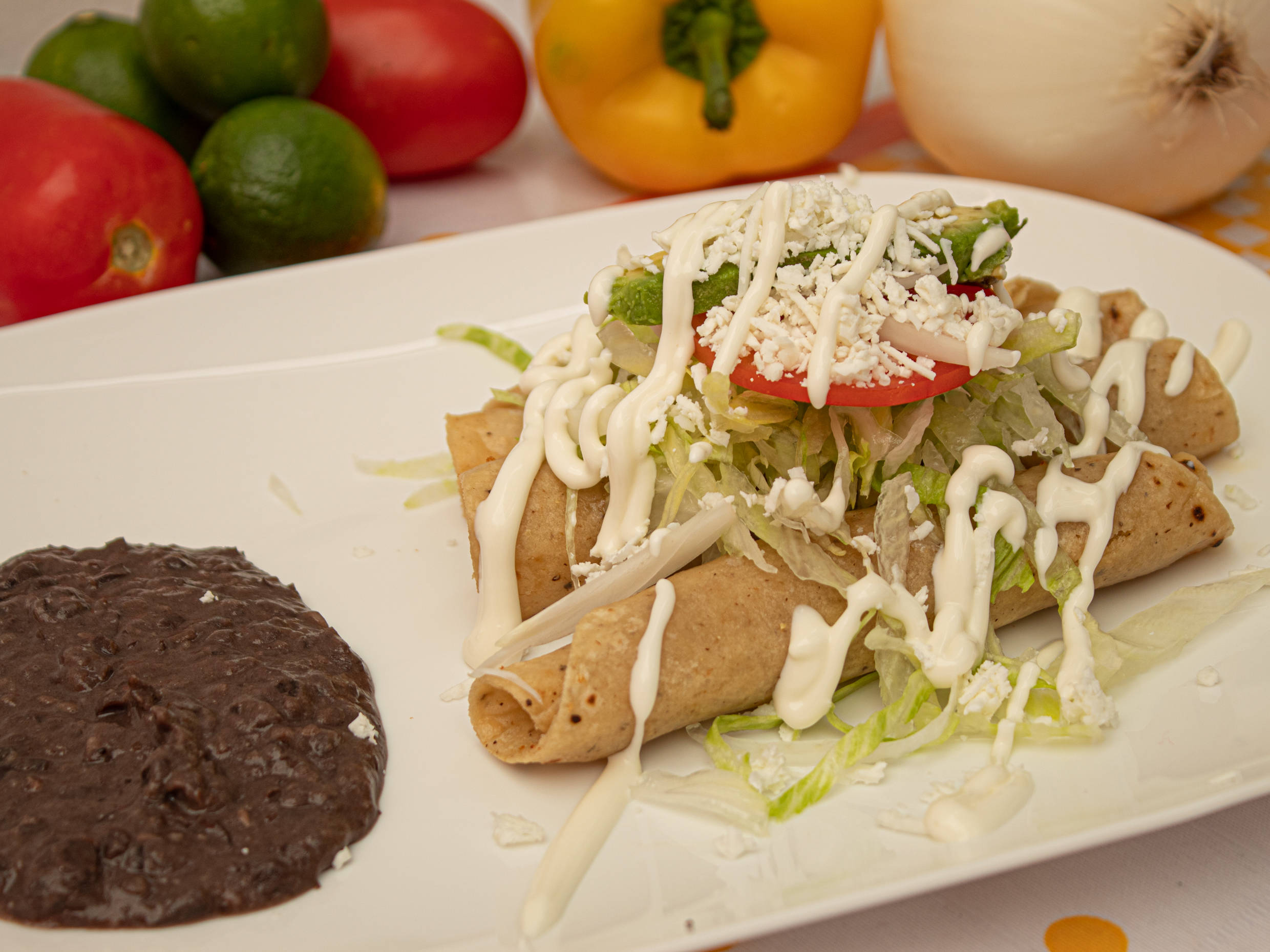 Combo Tacos Dorados + Agua