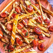 Salchipapas + soda