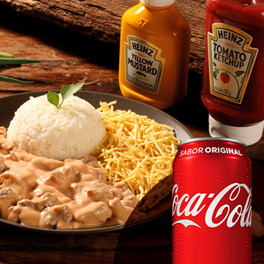 Saboreie 250g (porção do item strogonoff) do clássico do Santo.
A combinação perfeita de tiras de carne macia e o nosso molho de Strogonoff com o toque de produtos Heinz, creme de leite e champignons.
Acompanha arroz branco, batata palha ou purê de batatas + 01 Coca-Cola lata 350ml (Original ou zero açucares)
(Os ingredientes do strogonoff não podem ser alterados e/ou retirados.)