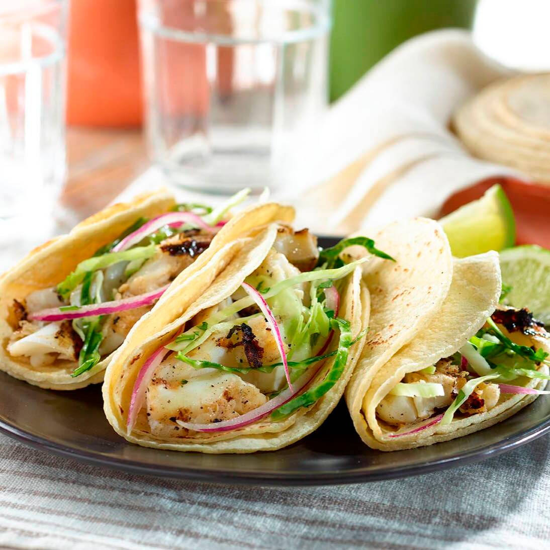 3 Tacos de Pescado + Agua