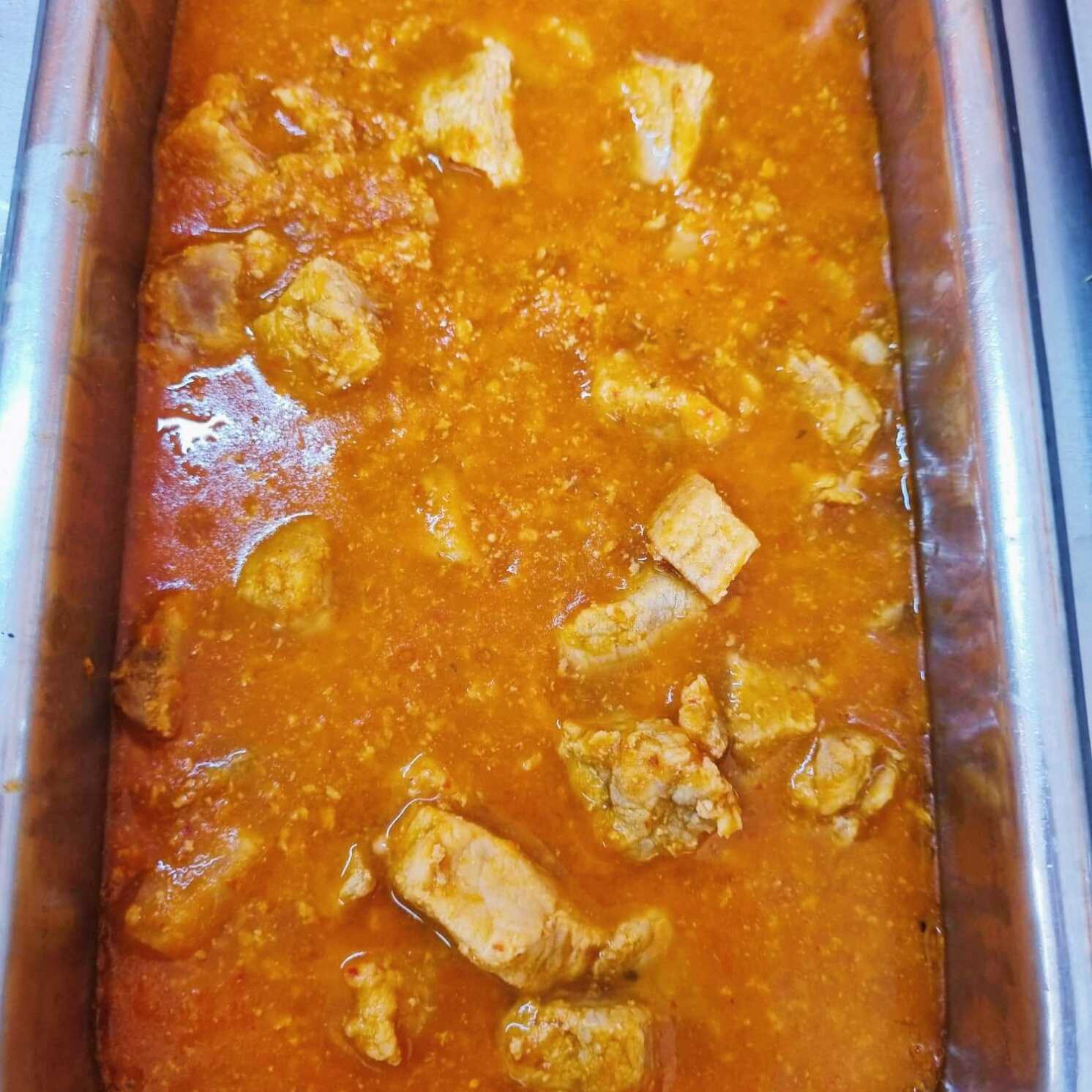Taco De Pierna De Puerco en Salsa Roja