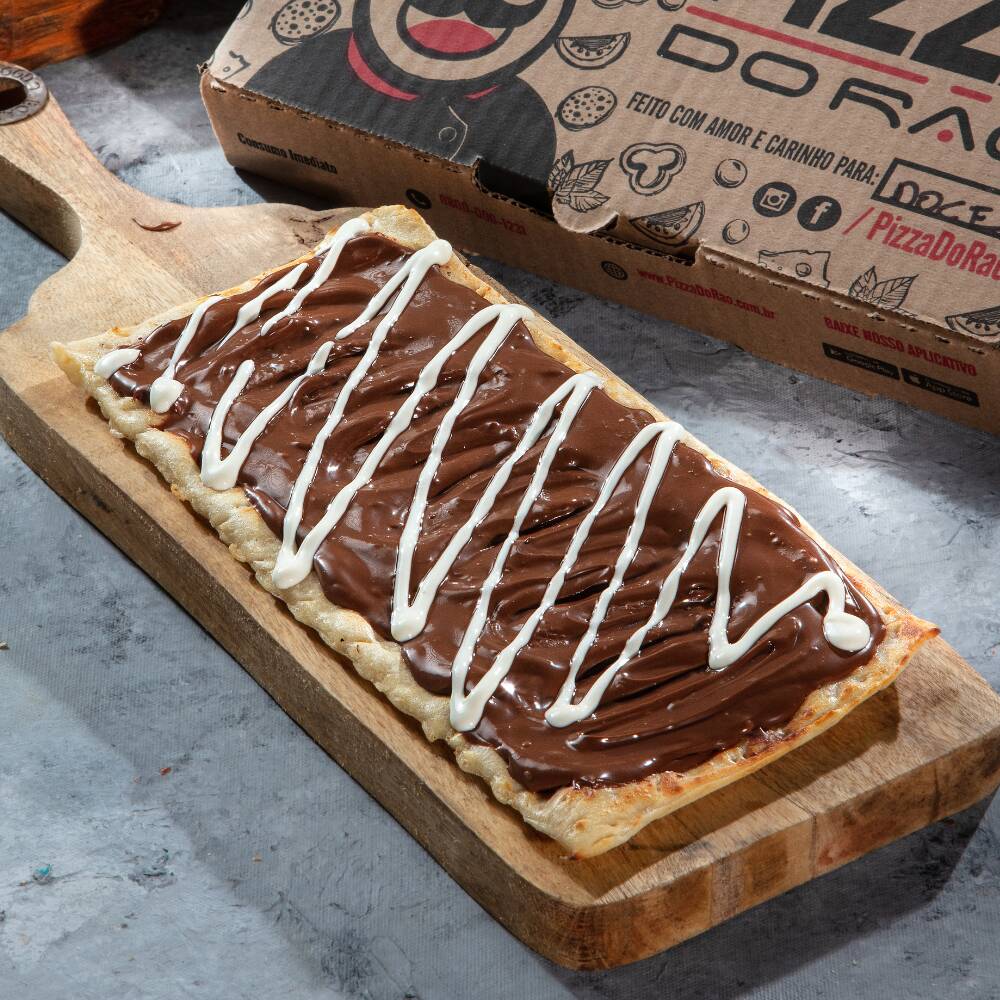 Chocolate ao leite cremoso e finalizado com fina camada de creme de leite.