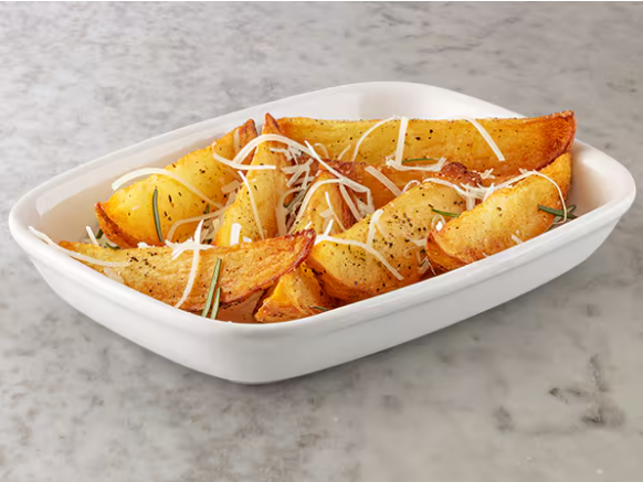 Batata rústica temperada com toque Abbraccio, alecrim, finalizada com parmesão e azeite saborizado com alecrim e limão-siciliano. Porção individual.