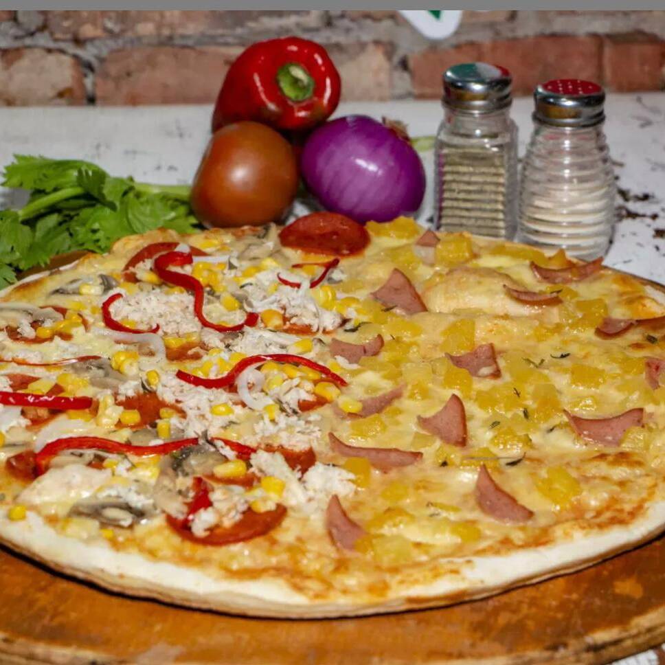 Nueva pizza de 2 Mitades (8 porciones)
