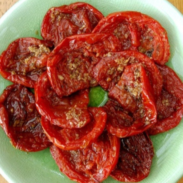 Porção 100g de tomate seco.