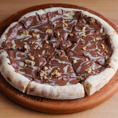 A pizza de mais de 1 sabor será cobrada pelo preço cheio do sabor mais caro.