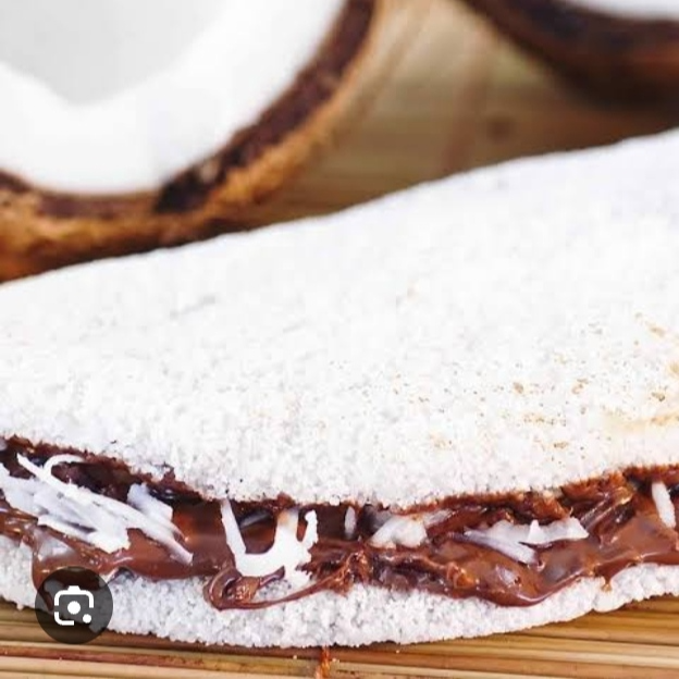 Coco natural ralado com chocolate ao leite cremoso.