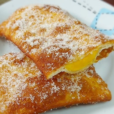 Com muito queijo e melaço